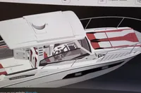 2022 Karnic CS 700HT boat, sleek design with red and white seating, top view.