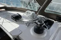2024 Bavaria C38 yacht deck with winch and coiled ropes.