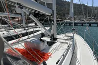 2024 Bavaria C38 yacht deck with ropes and marina backdrop.
