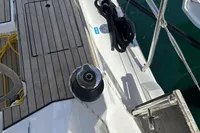 Deck of 2024 Bavaria C38 yacht with winch and ropes.