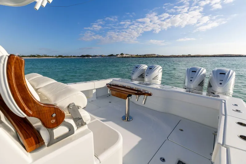 Just Looking Yacht Photos Pics Luxury Freeman 47 boat, 2024 model, with four powerful engines on a serene sea.