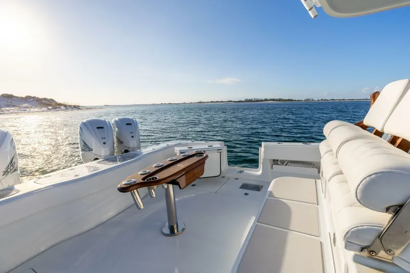 Just Looking Yacht Photos Pics Luxurious 2024 Freeman 47 boat with dual engines, spacious seating, and ocean view.