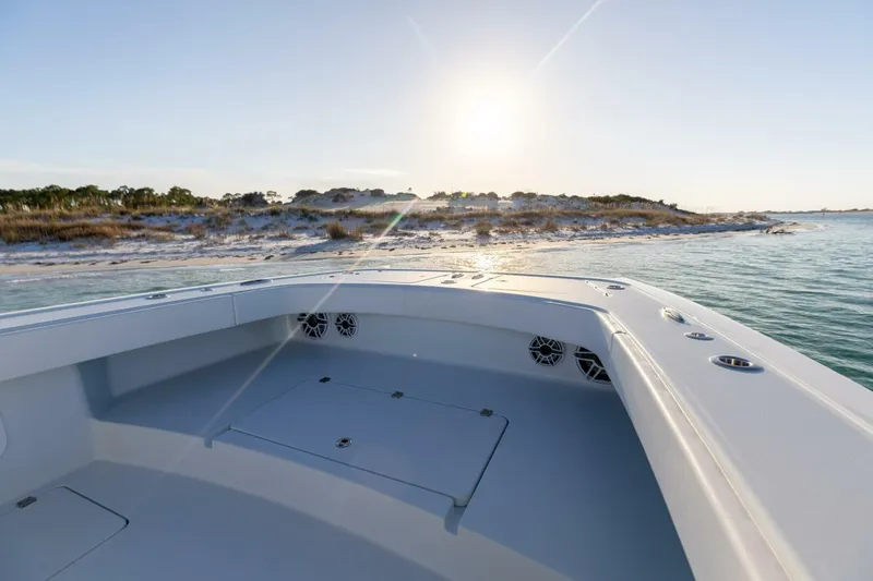 Just Looking Yacht Photos Pics 2024 Freeman 47 boat deck with ocean view at sunrise.