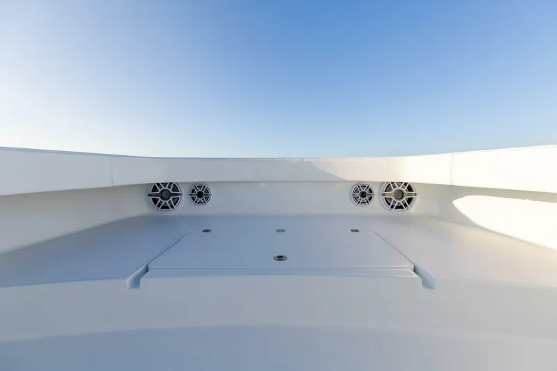 Just Looking Yacht Photos Pics 2024 Freeman 47 boat deck with built-in speakers under clear blue sky.