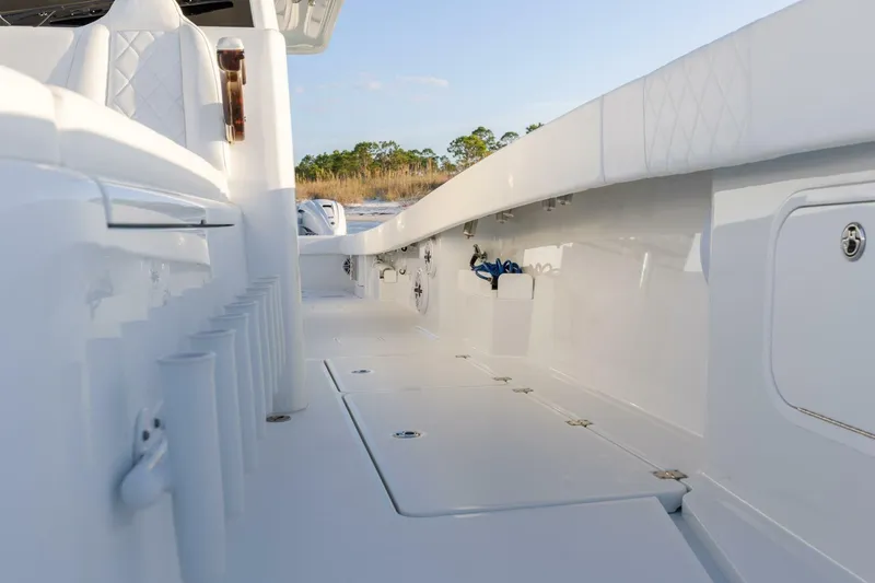 Just Looking Yacht Photos Pics 2024 Freeman 47 boat interior with sleek white design and storage compartments.