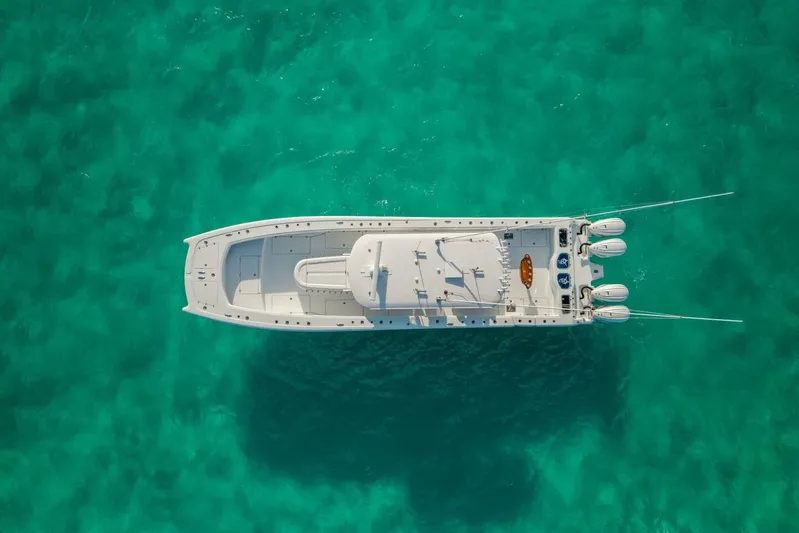 Just Looking Yacht Photos Pics Aerial view of 2024 Freeman 47 boat on clear turquoise water.