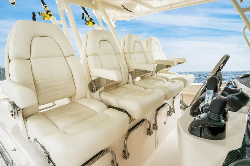  Yacht Photos Pics Manufacturer Provided Image: 2022 Grady-White Canyon 456 boat interior with luxurious white seating.