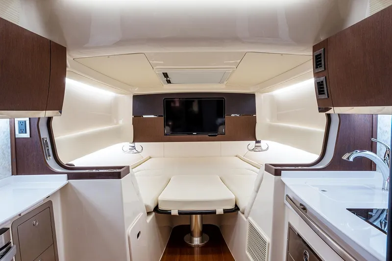  Yacht Photos Pics Manufacturer Provided Image: 2022 Grady-White Canyon 456 cabin interior with modern amenities and sleek design.