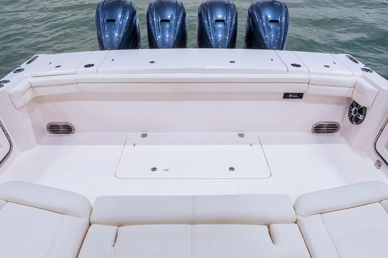  Yacht Photos Pics Manufacturer Provided Image: 2022 Grady-White Canyon 456 boat with quad outboard engines and spacious deck.
