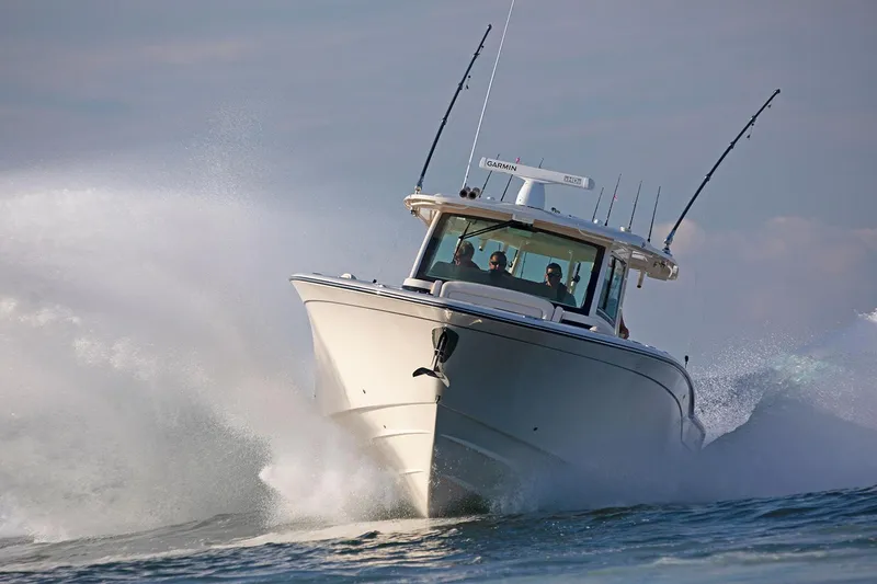  Yacht Photos Pics Manufacturer Provided Image: 2022 Grady-White Canyon 456 boat cruising on water.