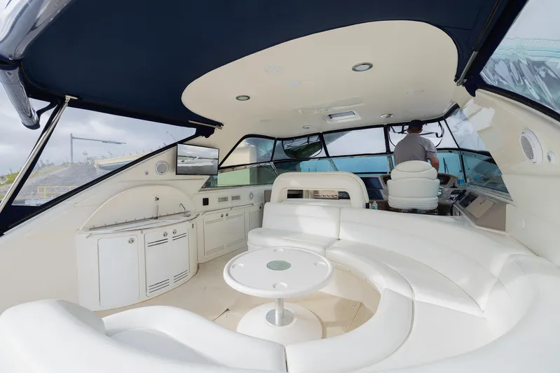 Paulay D Yacht Photos Pics Luxurious 2005 Sea Ray 600 Sun Sport yacht interior with white seating and modern helm.