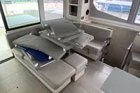 Modern Leopard 45 yacht interior, 2020 model, featuring spacious seating and large windows.