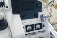 Leopard 45 yacht helm with navigation instruments and steering wheel, 2020 model.