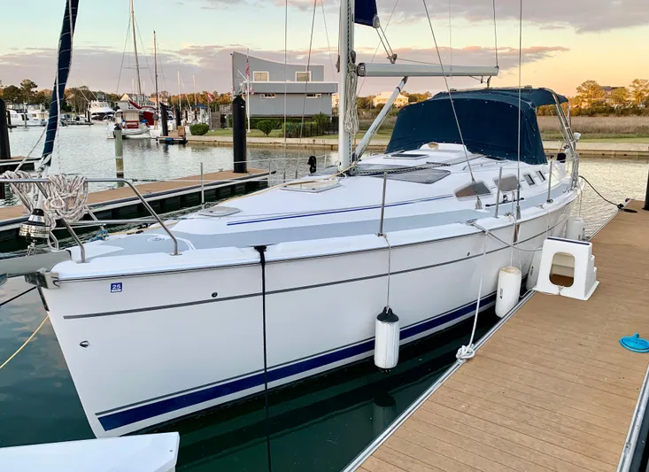 Light Seeker Yacht Photos Pics Sailboat docked at marina, Hunter 41 AC, 2005 model, sunset background.