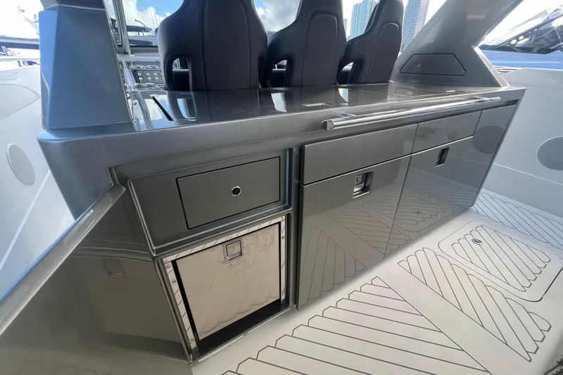  Yacht Photos Pics 2023 Canados 493 Gladiator yacht interior with sleek cabinetry and modern design.