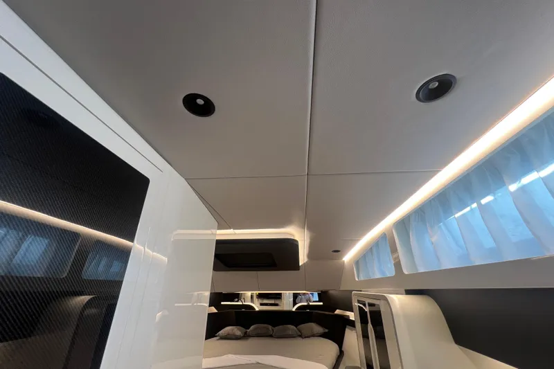  Yacht Photos Pics Luxurious interior of 2023 Canados 493 Gladiator yacht with modern design and ambient lighting.