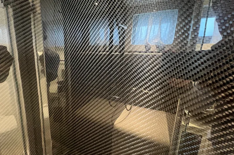  Yacht Photos Pics Carbon fiber interior of 2023 Canados 493 Gladiator yacht, showcasing modern design elements.