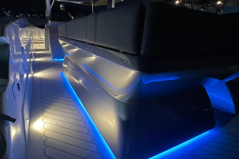  Yacht Photos Pics 2023 Canados 493 Gladiator boat interior with blue LED lighting.