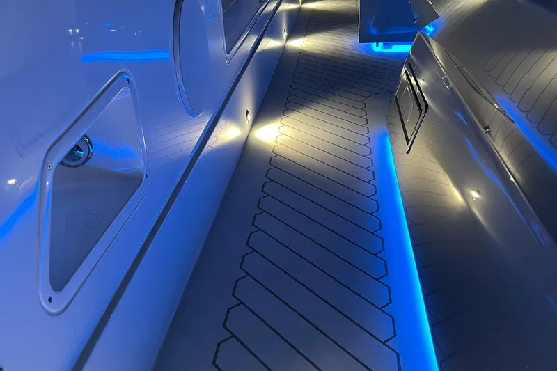  Yacht Photos Pics 2023 Canados 493 Gladiator yacht interior with sleek blue LED lighting.