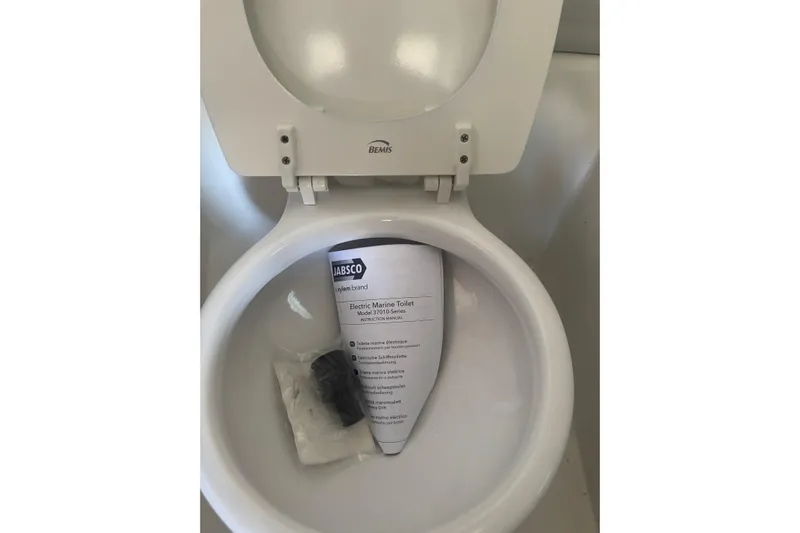  Yacht Photos Pics 2024 Parker 2820 XLD Sport Cabin marine toilet with Jabsco manual inside.