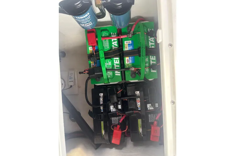 Yacht Photos Pics Battery compartment of 2024 Parker 2820 XLD Sport Cabin with multiple batteries and wiring.