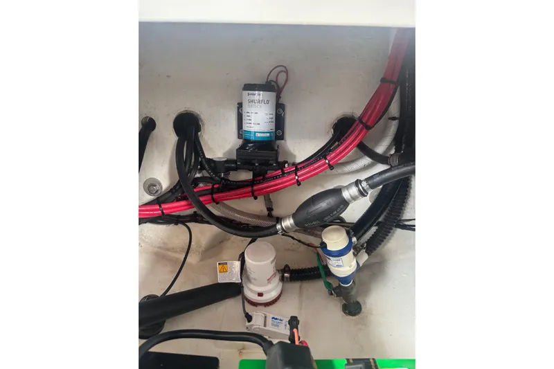  Yacht Photos Pics Engine compartment of 2024 Parker 2820 XLD Sport Cabin with wiring and pump system.