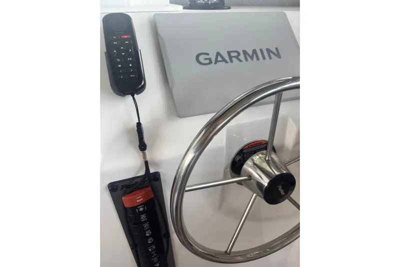 Yacht Photos Pics Steering wheel and Garmin system in 2024 Parker 2820 XLD Sport Cabin boat.