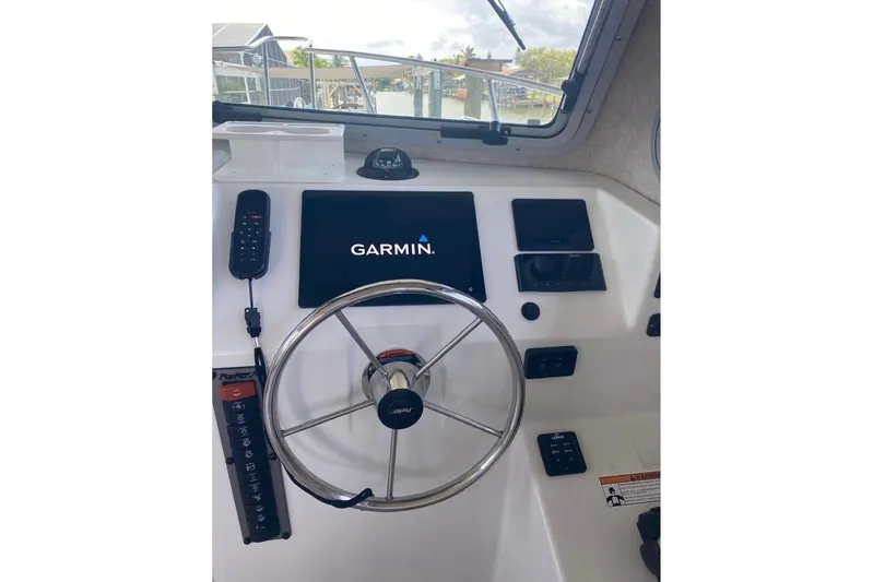  Yacht Photos Pics 2024 Parker 2820 XLD Sport Cabin helm with Garmin navigation system.