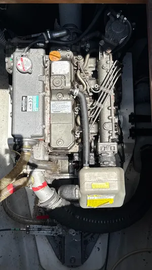 Aquamarine Yacht Photos Pics Engine compartment of a 2013 Lagoon 450 F catamaran, showcasing mechanical components.