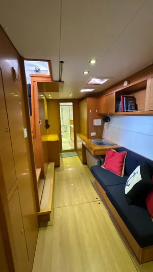 Aquamarine Yacht Photos Pics Interior of 2013 Lagoon 450 F yacht with cozy seating and wooden finishes.