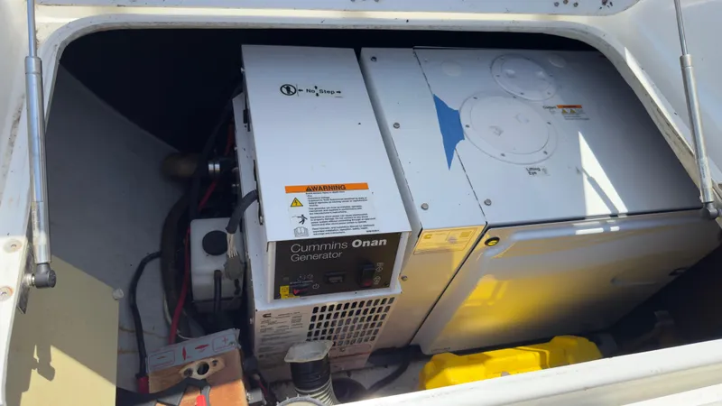 Aquamarine Yacht Photos Pics Cummins Onan generator in a 2013 Lagoon 450 F yacht engine compartment.