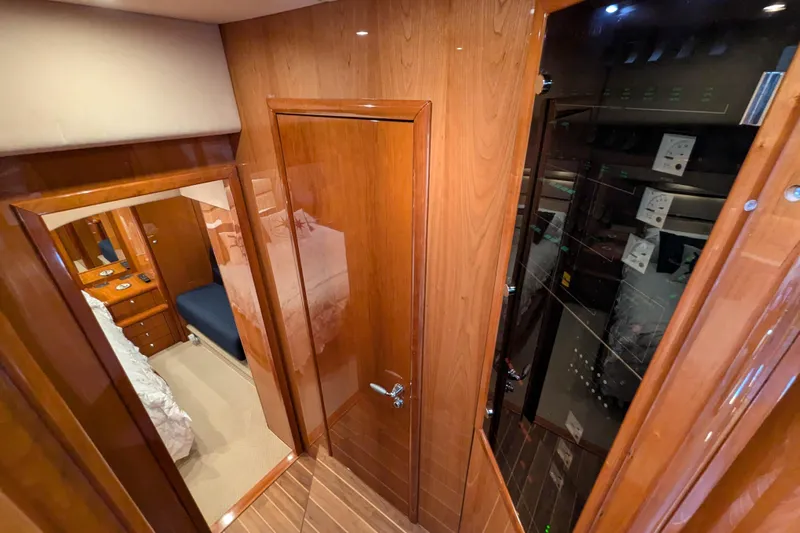 Yacht Photos Pics Luxurious interior of 2006 Sunseeker Predator 68 yacht with polished wood finishes.
