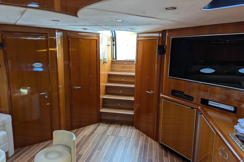  Yacht Photos Pics Luxurious interior of 2006 Sunseeker Predator 68 yacht with wooden finishes and modern amenities.