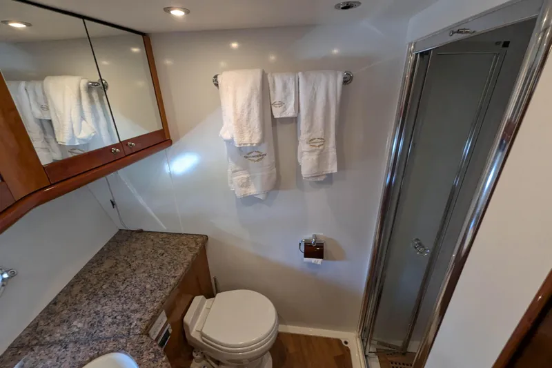  Yacht Photos Pics Luxurious bathroom in 2006 Sunseeker Predator 68 yacht with granite countertop and shower.