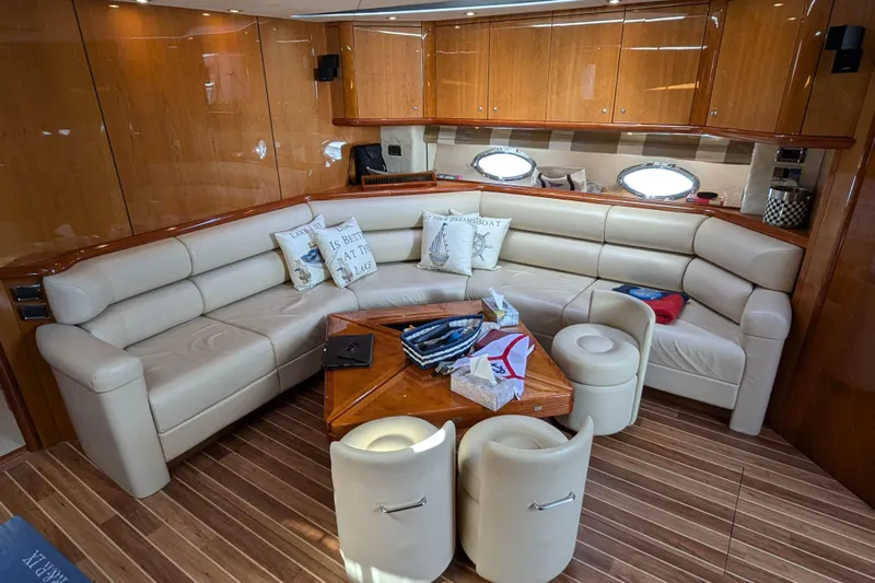  Yacht Photos Pics Luxurious interior of 2006 Sunseeker Predator 68 yacht with elegant seating and wooden finishes.