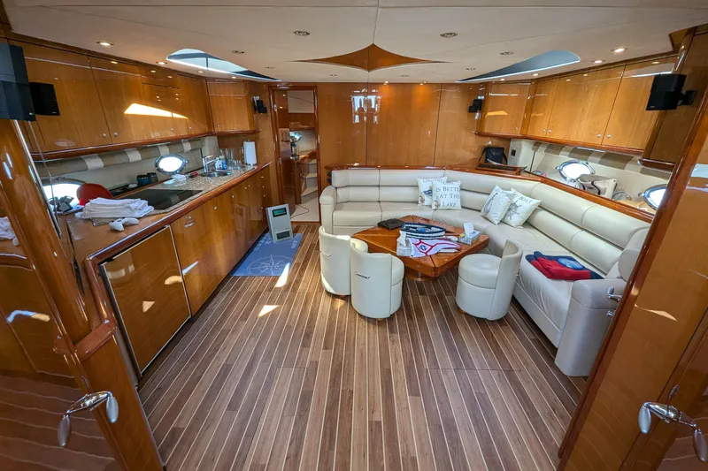  Yacht Photos Pics Luxurious interior of 2006 Sunseeker Predator 68 yacht with elegant wood finishes.