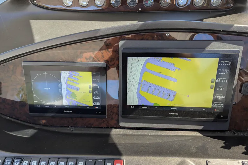  Yacht Photos Pics Garmin navigation screens on 2006 Sunseeker Predator 68 yacht dashboard.