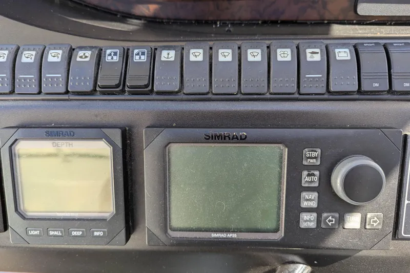  Yacht Photos Pics Control panel of a 2006 Sunseeker Predator 68 yacht with Simrad navigation displays.