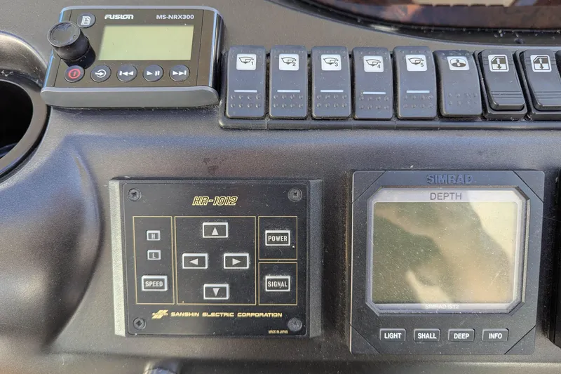  Yacht Photos Pics Control panel of a 2006 Sunseeker Predator 68 yacht with navigation and audio systems.