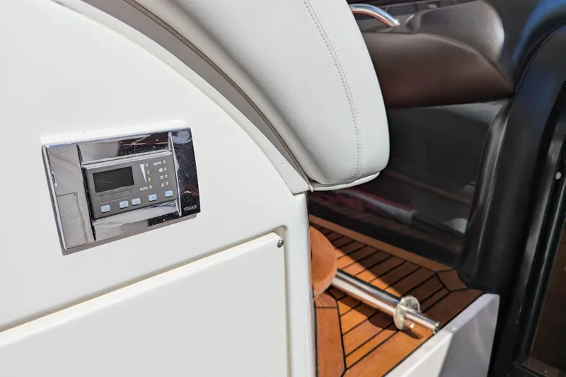  Yacht Photos Pics Control panel and seating on 2006 Sunseeker Predator 68 yacht interior.