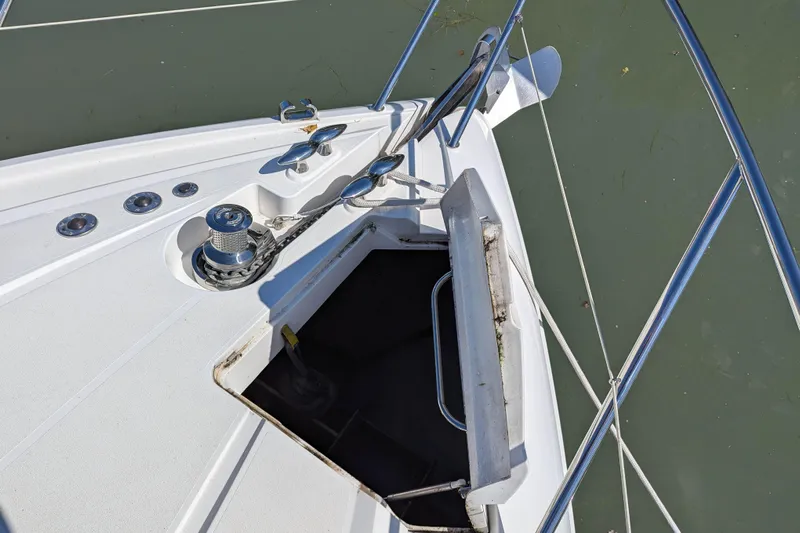  Yacht Photos Pics Bow of 2006 Sunseeker Predator 68 yacht with anchor and open hatch.