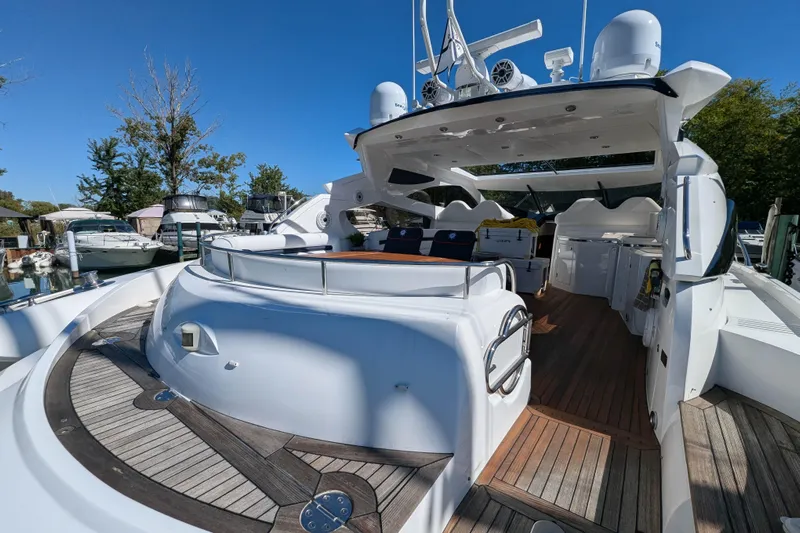  Yacht Photos Pics 2006 Sunseeker Predator 68 yacht with spacious deck and modern amenities.