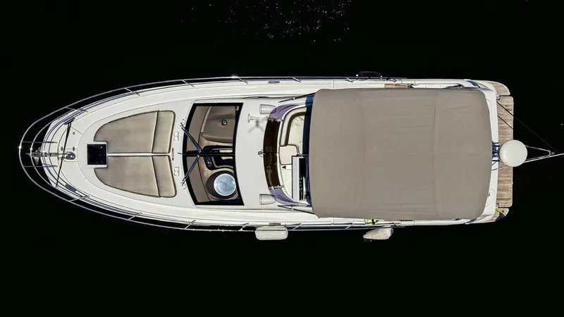 Queen Of Ark Yacht Photos Pics Overhead view of 2017 Azimut 42 Fly yacht on dark water.