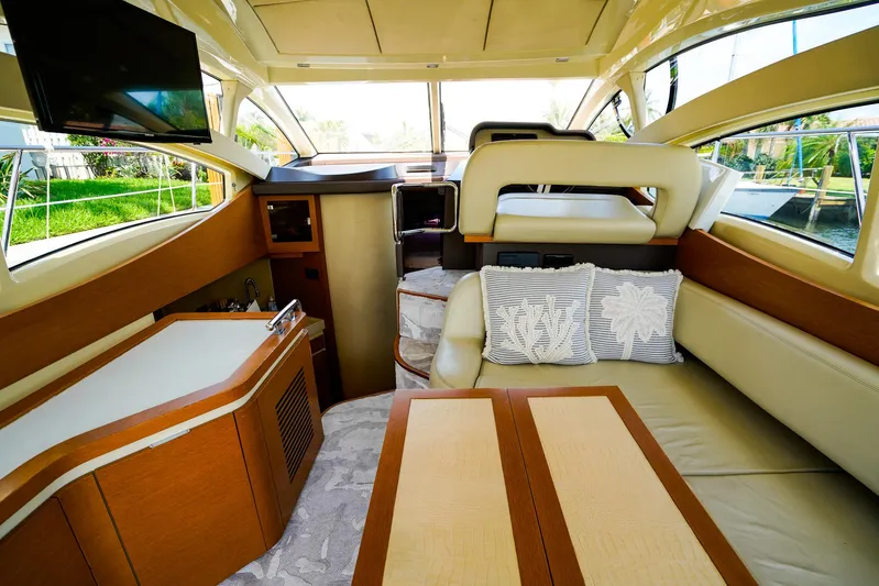 Queen Of Ark Yacht Photos Pics Luxurious interior of 2017 Azimut 42 Fly yacht with elegant seating and modern amenities.