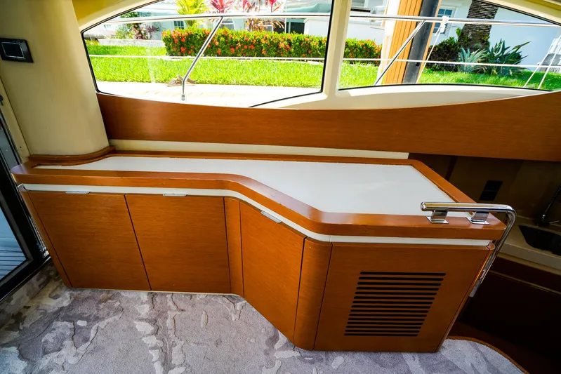 Queen Of Ark Yacht Photos Pics Luxurious interior of 2017 Azimut 42 Fly yacht with elegant wood cabinetry.