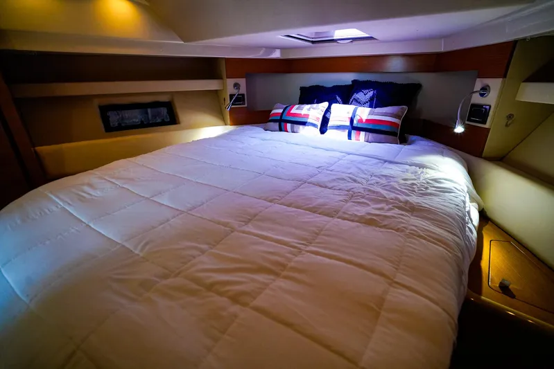 Queen Of Ark Yacht Photos Pics Luxurious bedroom interior of 2017 Azimut 42 Fly yacht with cozy bedding.