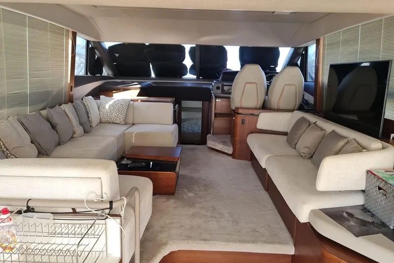  Yacht Photos Pics Luxurious interior of a 2019 Princess F55 yacht with elegant seating and modern design.