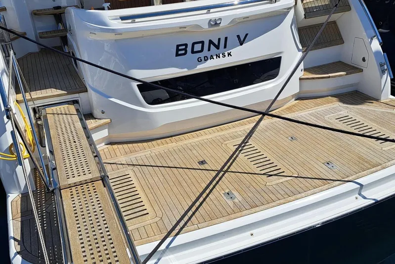  Yacht Photos Pics 2019 Princess F55 yacht stern with wooden deck, named "Boni V" from Gdansk.
