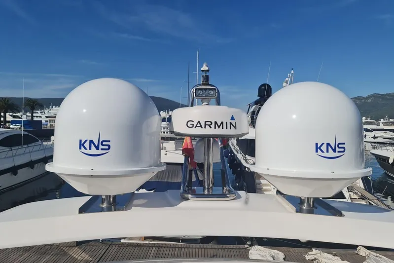  Yacht Photos Pics 2019 Princess F55 yacht with KNS and Garmin satellite equipment, docked in a marina.