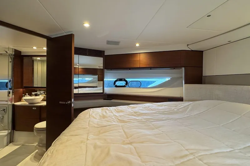  Yacht Photos Pics Luxurious 2019 Princess F55 yacht bedroom with modern design and ensuite bathroom.